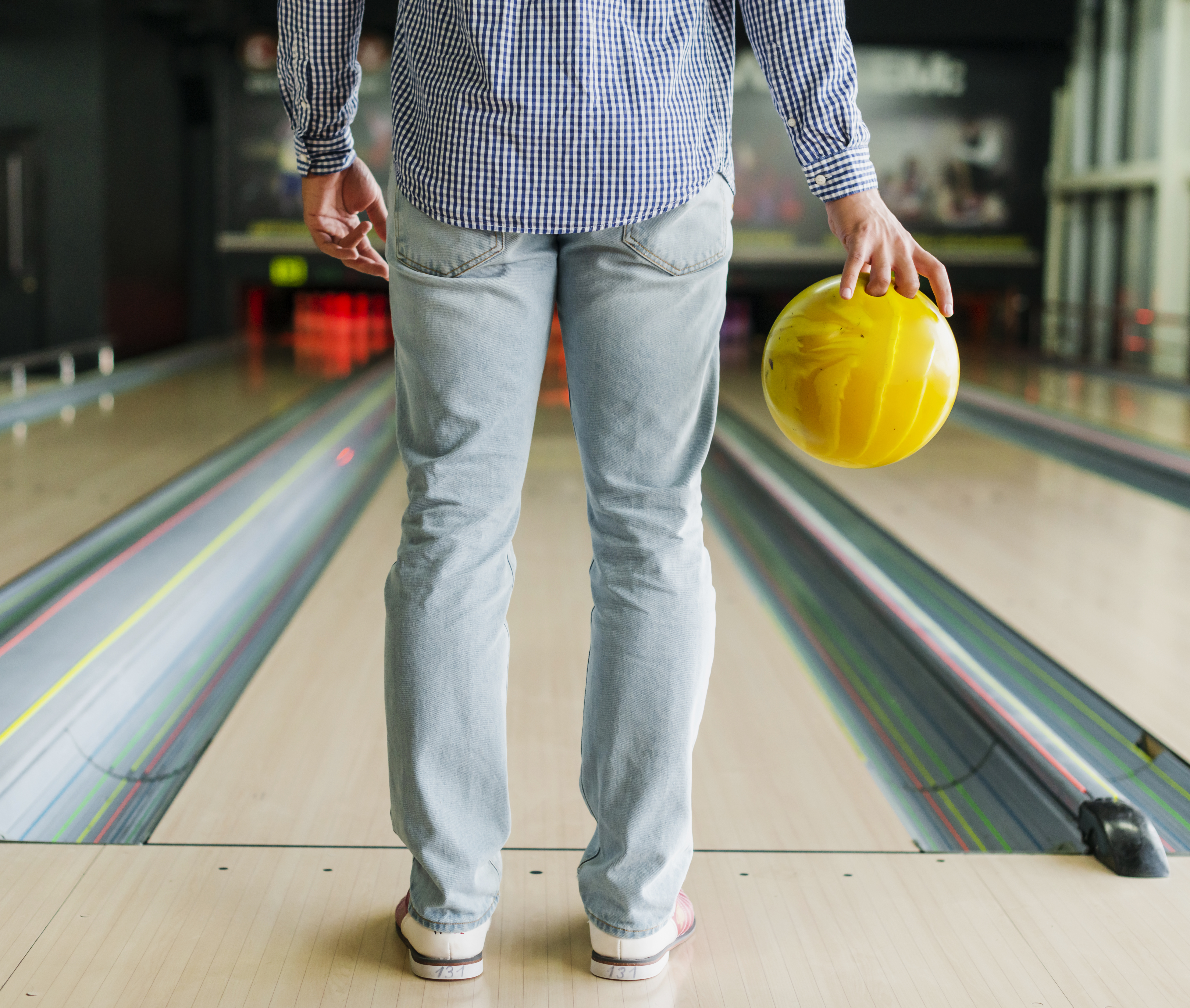 Person Holding Bowling Ball
