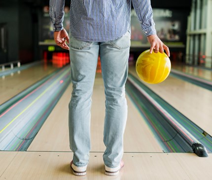 Person Holding Bowling Ball