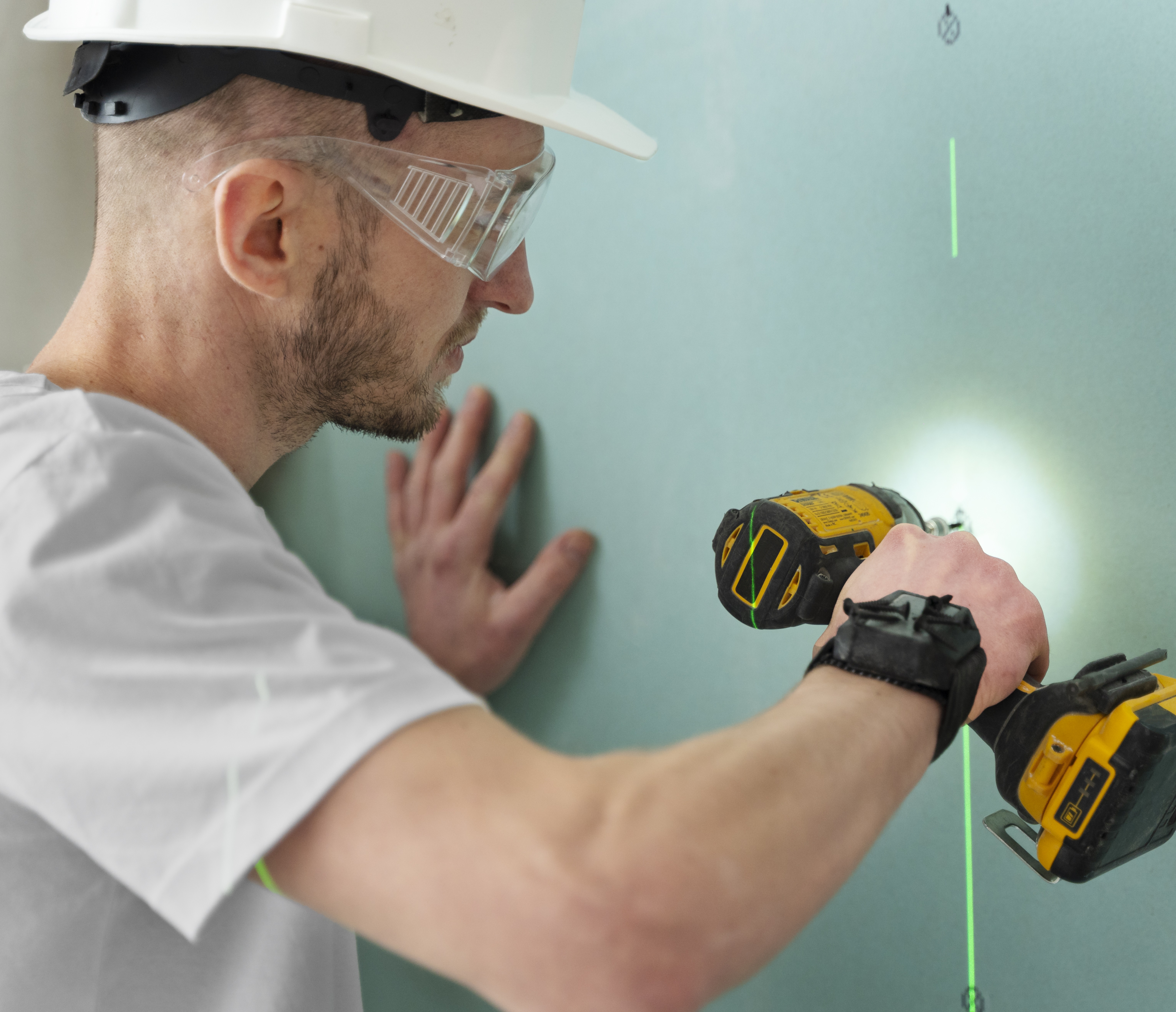 Medium Shot Construction Worker Holding Drill